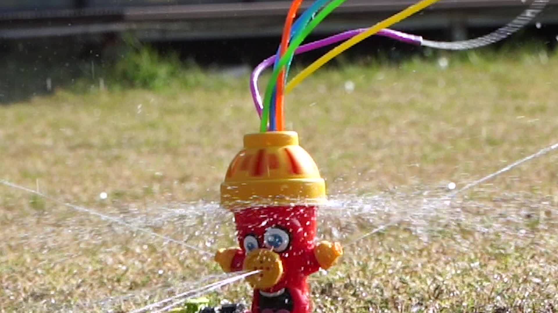SplashZone | Rotierender Wassersprinkler | Fun Design | Perfekt für Garten & Kinder