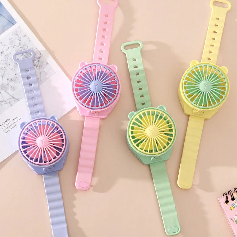 BreezeBuddy WristFan | Tragbarer Mini-Ventilator | Cartoon Design | USB-aufladbar | Für Kinder & Erwachsene