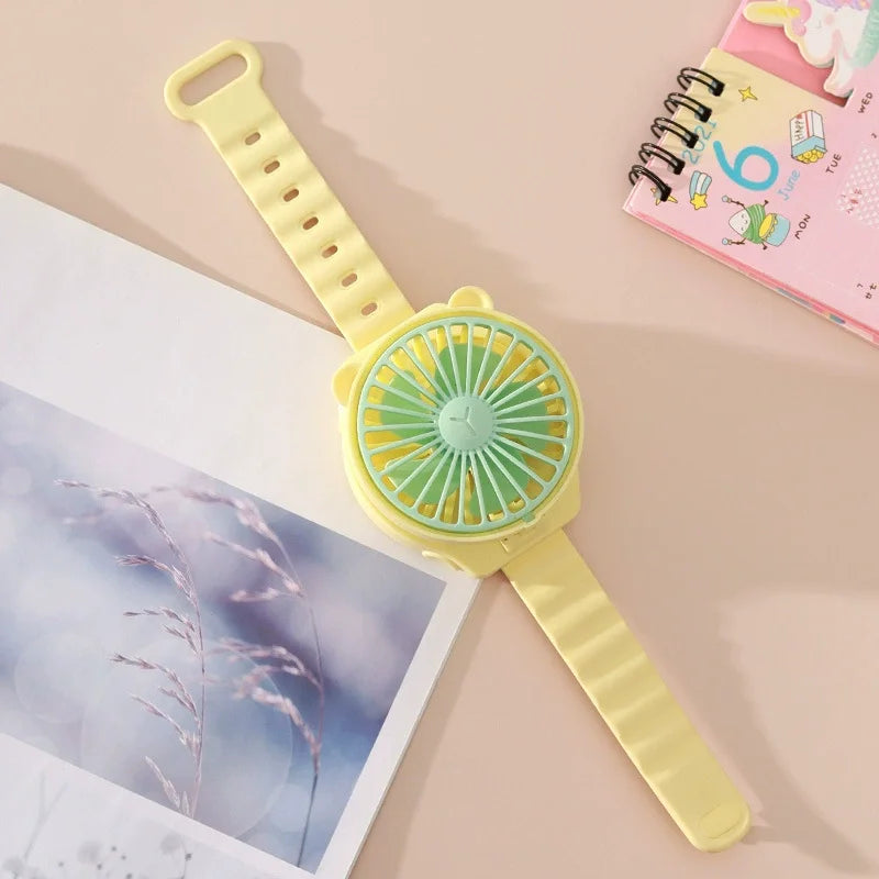 BreezeBuddy WristFan | Tragbarer Mini-Ventilator | Cartoon Design | USB-aufladbar | Für Kinder & Erwachsene