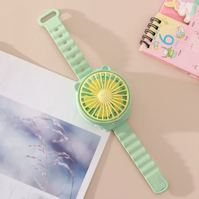 BreezeBuddy WristFan | Tragbarer Mini-Ventilator | Cartoon Design | USB-aufladbar | Für Kinder & Erwachsene