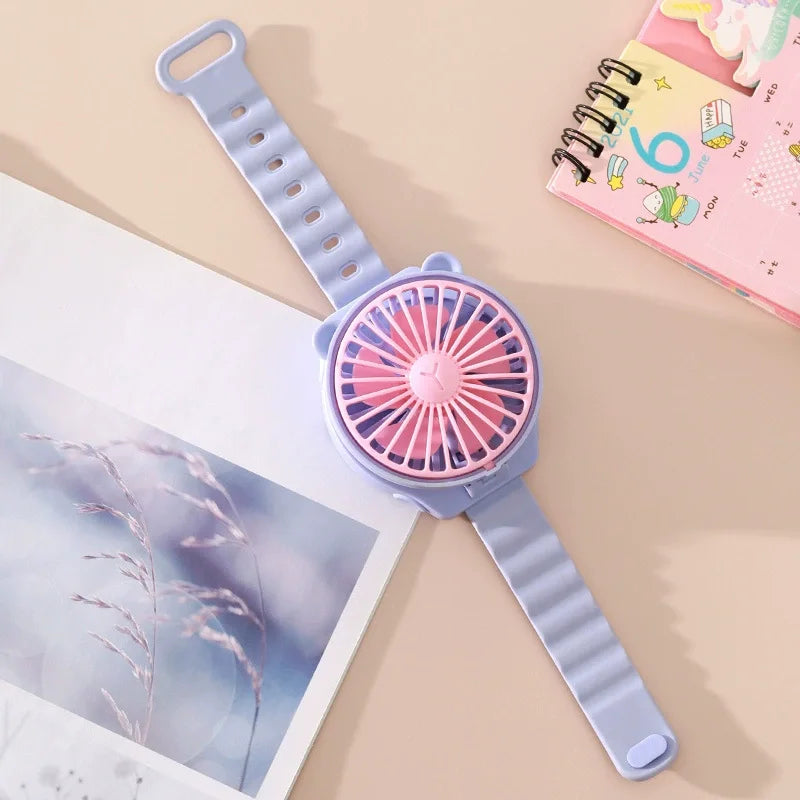 BreezeBuddy WristFan | Tragbarer Mini-Ventilator | Cartoon Design | USB-aufladbar | Für Kinder & Erwachsene