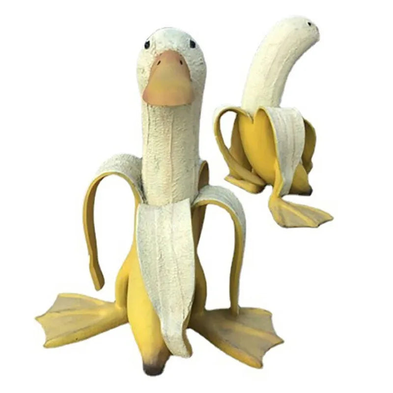 Bananapeck Gartenfigur | Lustige Ente im Bananen-Look | Handbemalt & Wetterfest | Resin