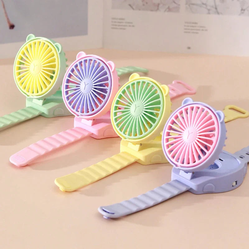 BreezeBuddy WristFan | Tragbarer Mini-Ventilator | Cartoon Design | USB-aufladbar | Für Kinder & Erwachsene