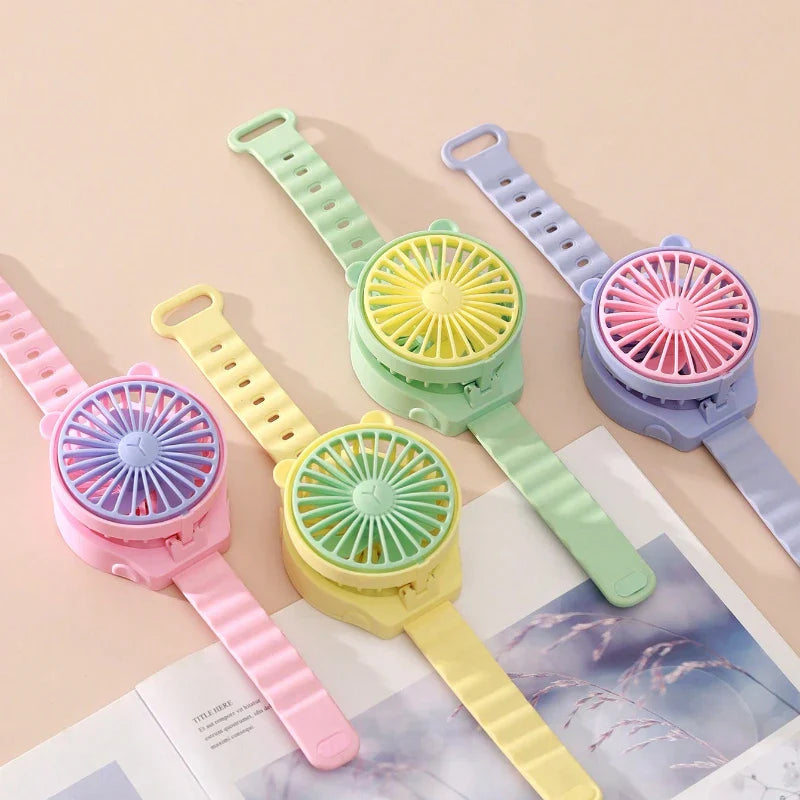 BreezeBuddy WristFan | Tragbarer Mini-Ventilator | Cartoon Design | USB-aufladbar | Für Kinder & Erwachsene