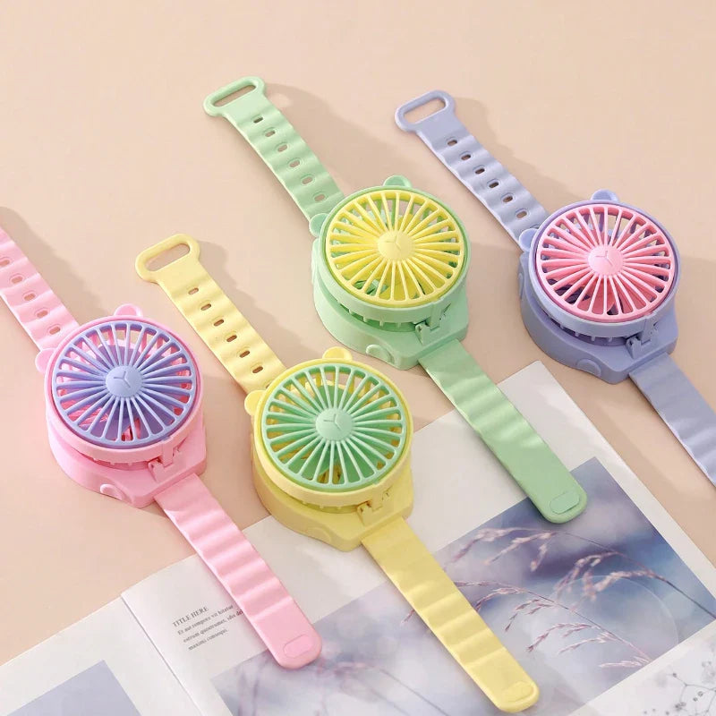 BreezeBuddy WristFan | Tragbarer Mini-Ventilator | Cartoon Design | USB-aufladbar | Für Kinder & Erwachsene